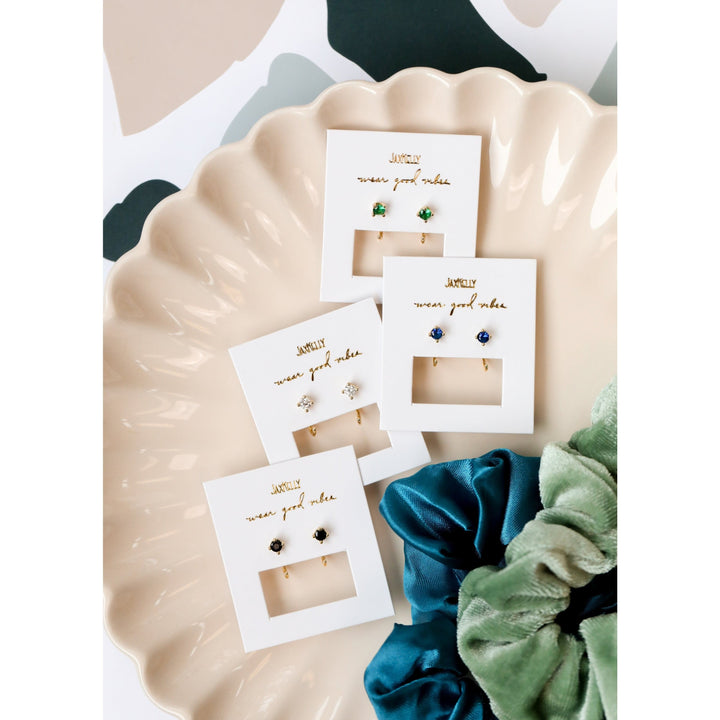 JaxKelly Earrings Emerald CZ Huggies