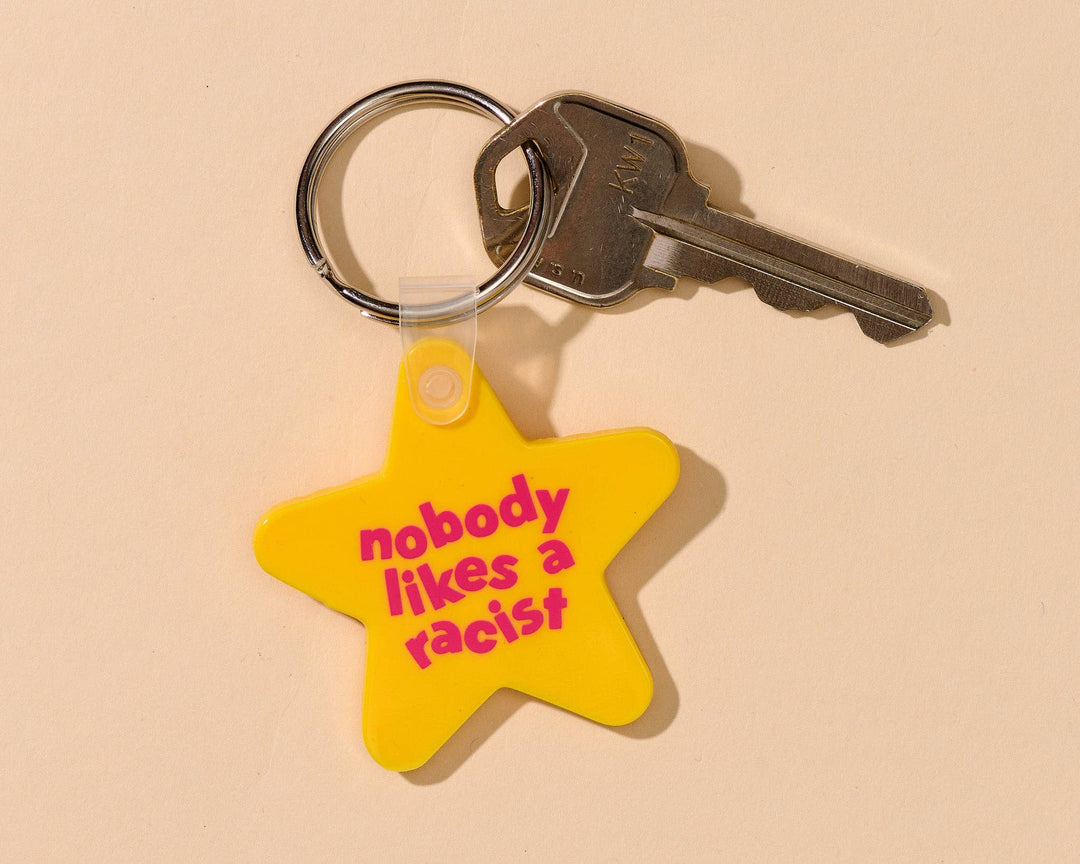 And Here We Are Gifts Nobody Likes A Racist Keychain