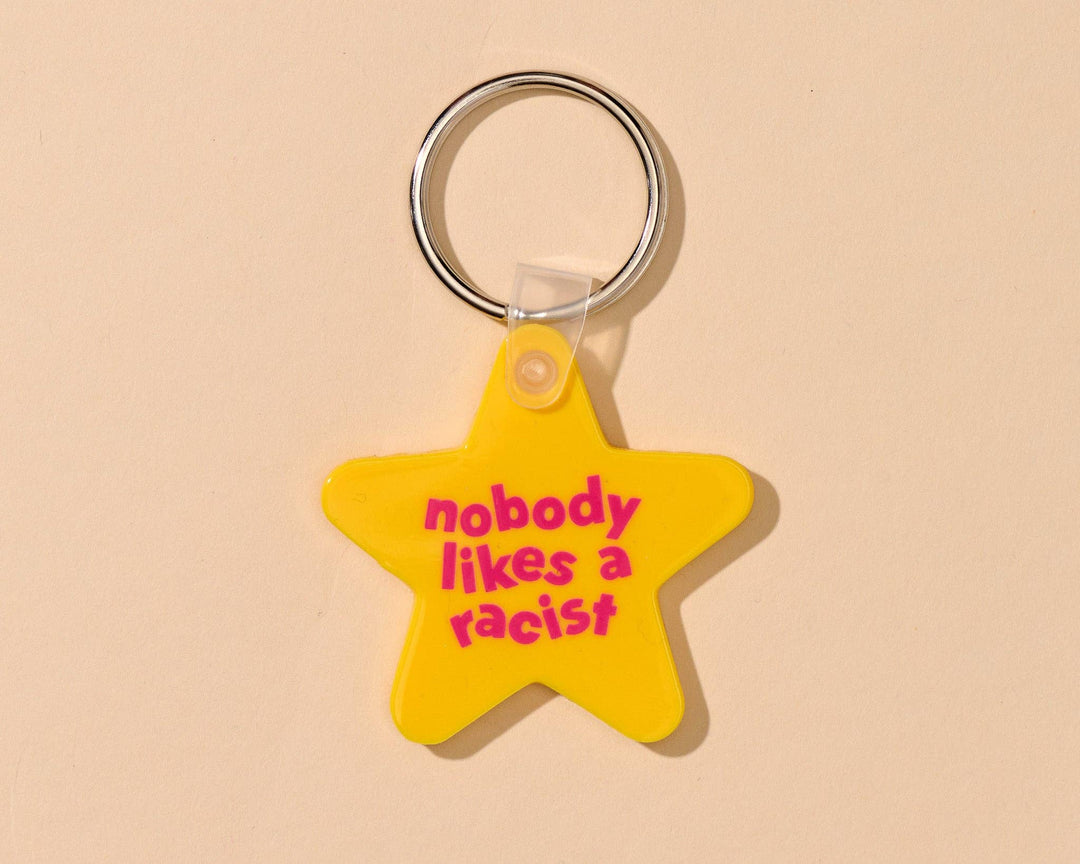 And Here We Are Gifts Nobody Likes A Racist Keychain
