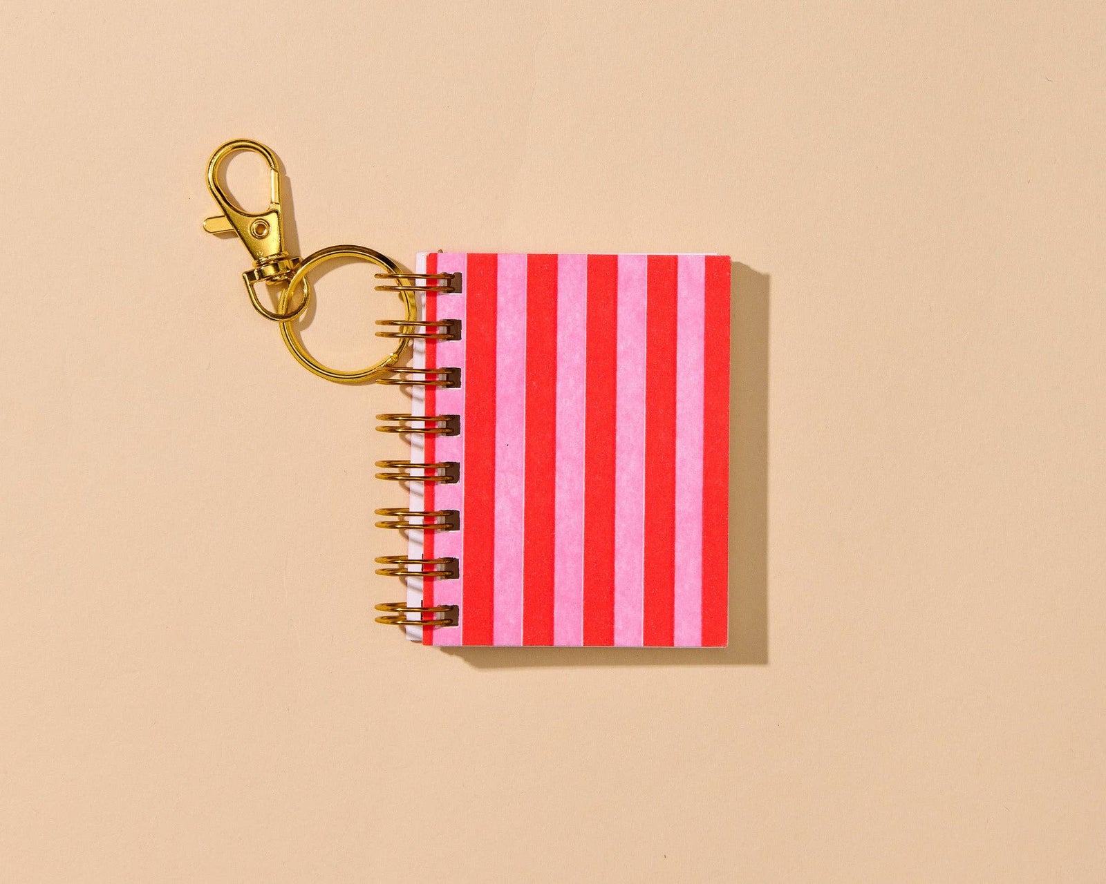 And Here We Are paper Letterpress Mini Notebook Bag Charm—Red Pink Cabana Stripe