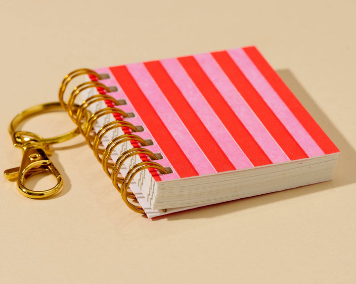 And Here We Are paper Letterpress Mini Notebook Bag Charm—Red Pink Cabana Stripe