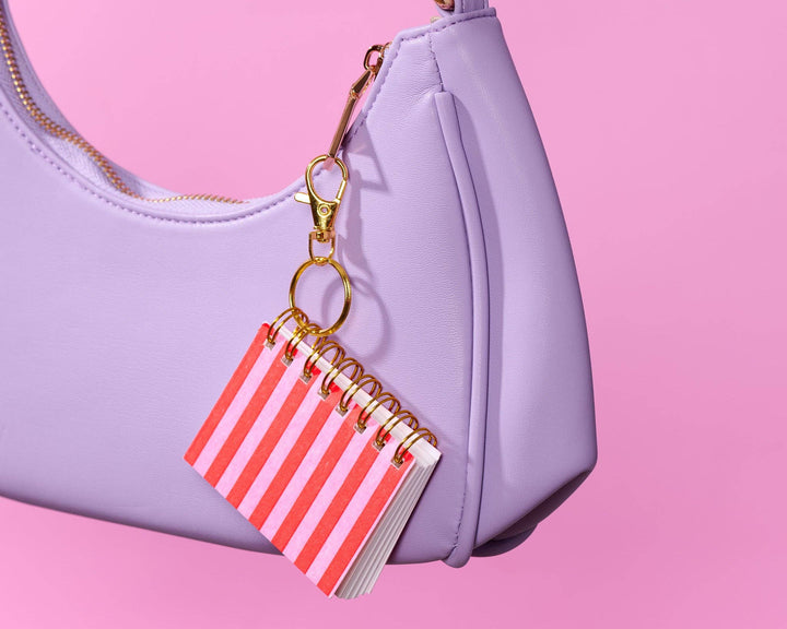 And Here We Are paper Letterpress Mini Notebook Bag Charm—Red Pink Cabana Stripe