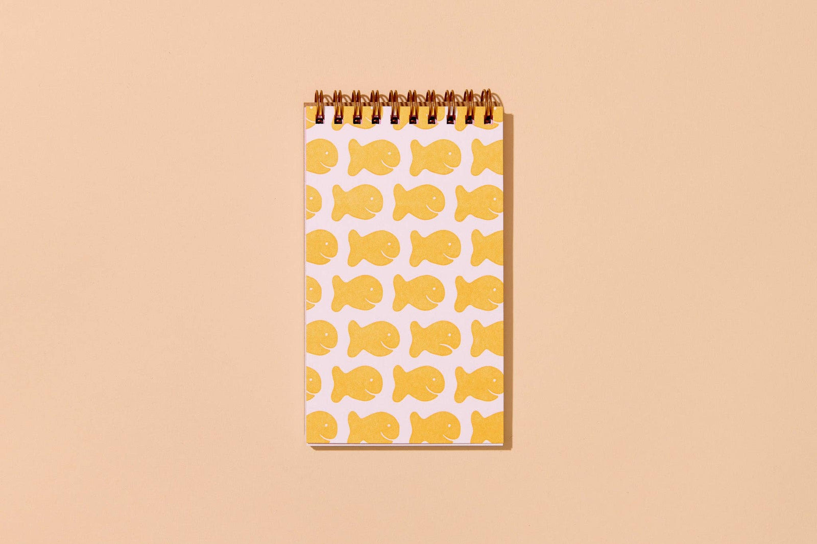 And Here We Are paper Letterpress Small Spiral Notebook—Goldfish Cracker