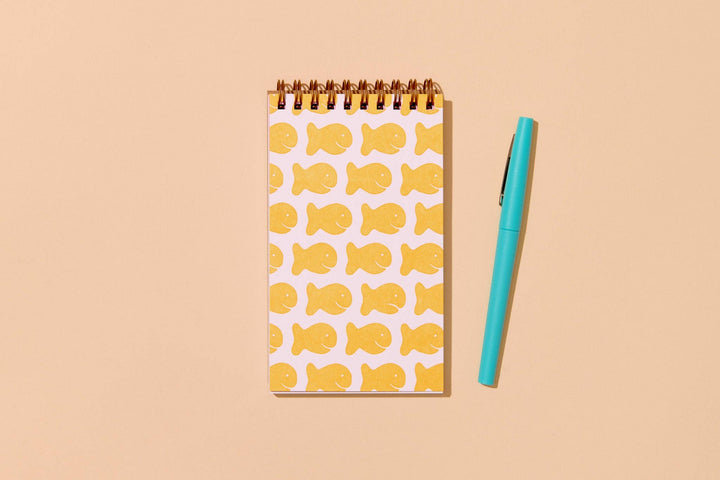 And Here We Are paper Letterpress Small Spiral Notebook—Goldfish Cracker