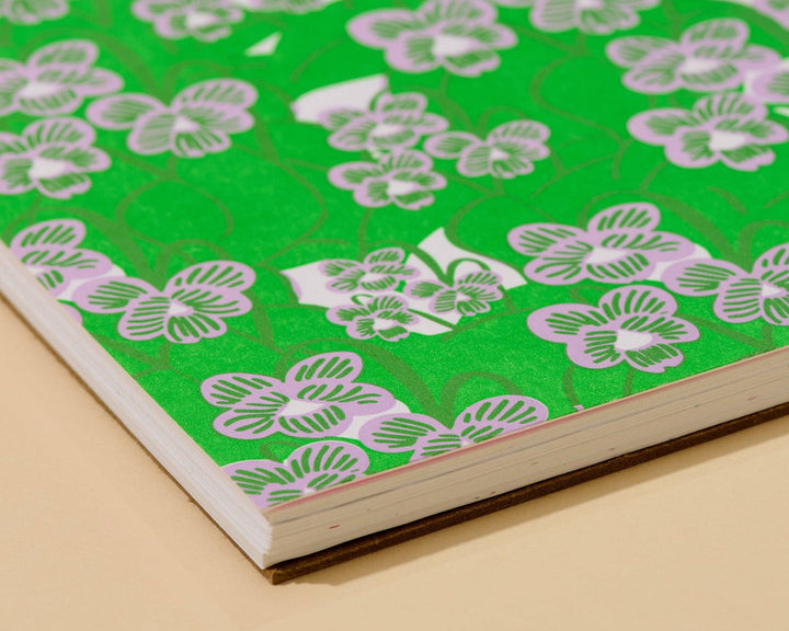 And Here We Are paper Letterpress Unlined Spiral Notebook—Violets