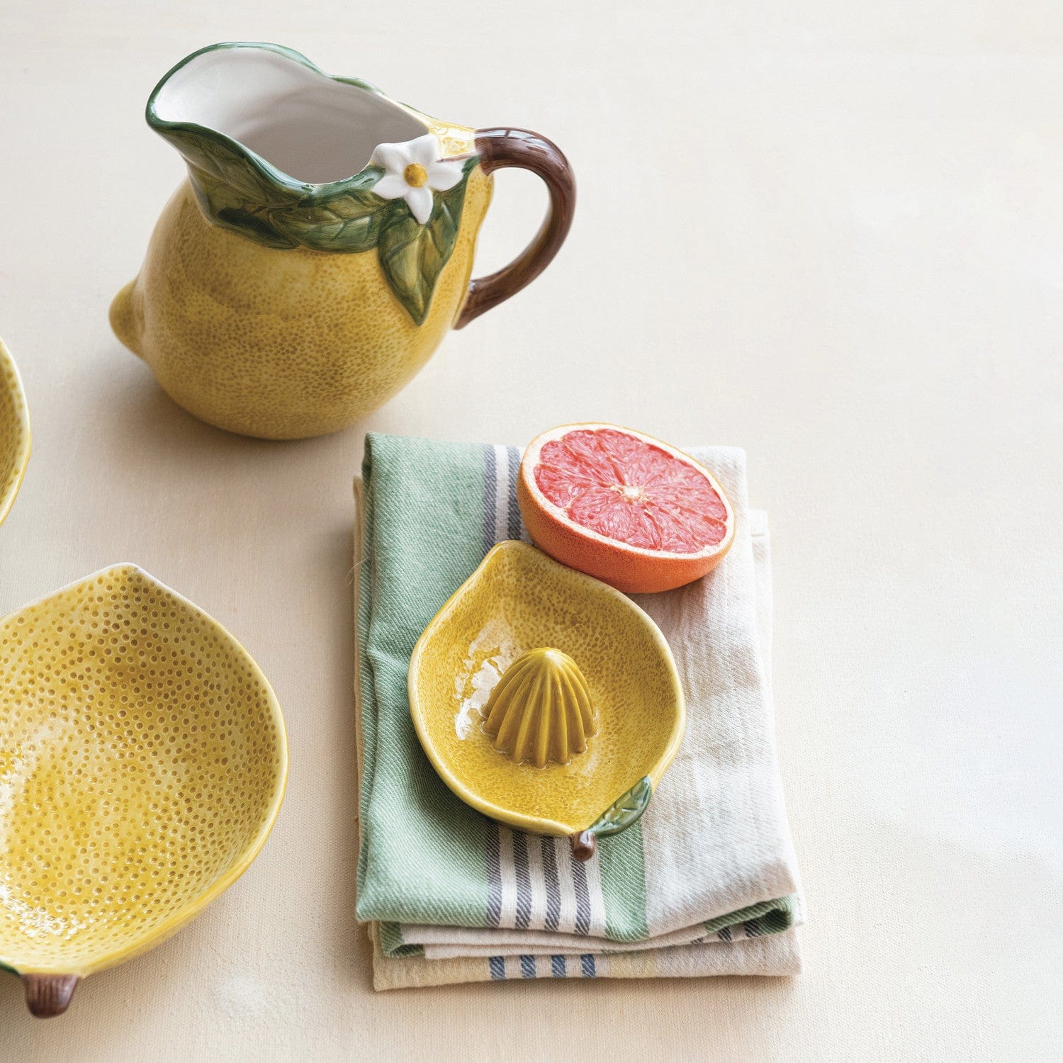 Creative Coop Home Hand-Painted Stoneware Lemon Shaped Juicer