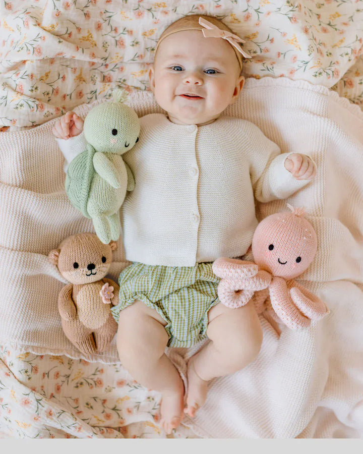 Cuddle + Kind Baby Baby octopus (soft coral pink)