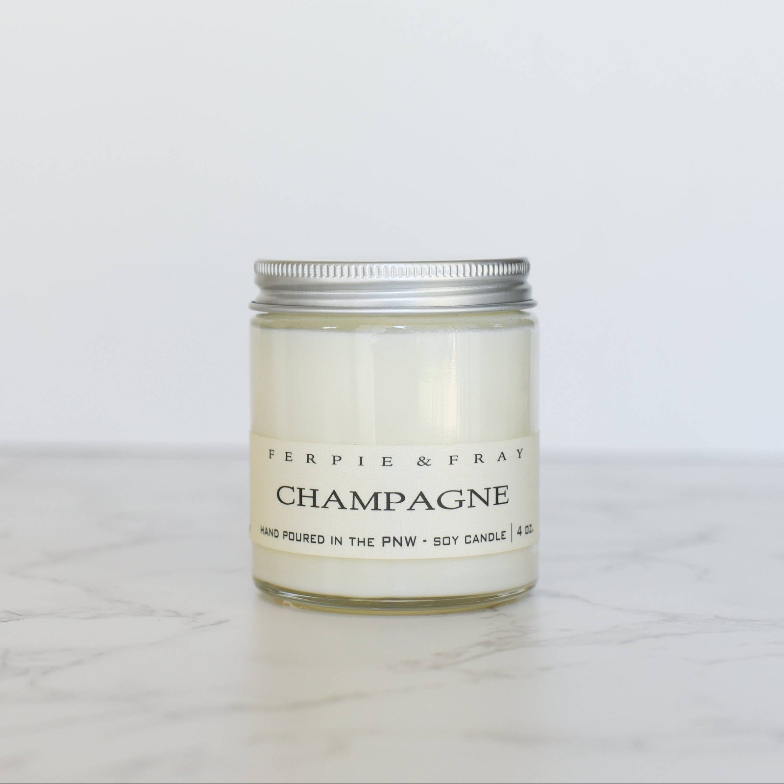 Ferpie + Fray Gifts Champagne Candle