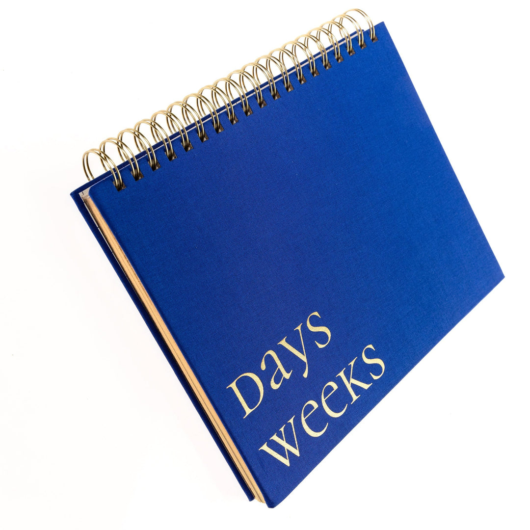 Graphique de France Paper Cobalt Blue Fabric-Covered Spiral Weekly Desk Pad