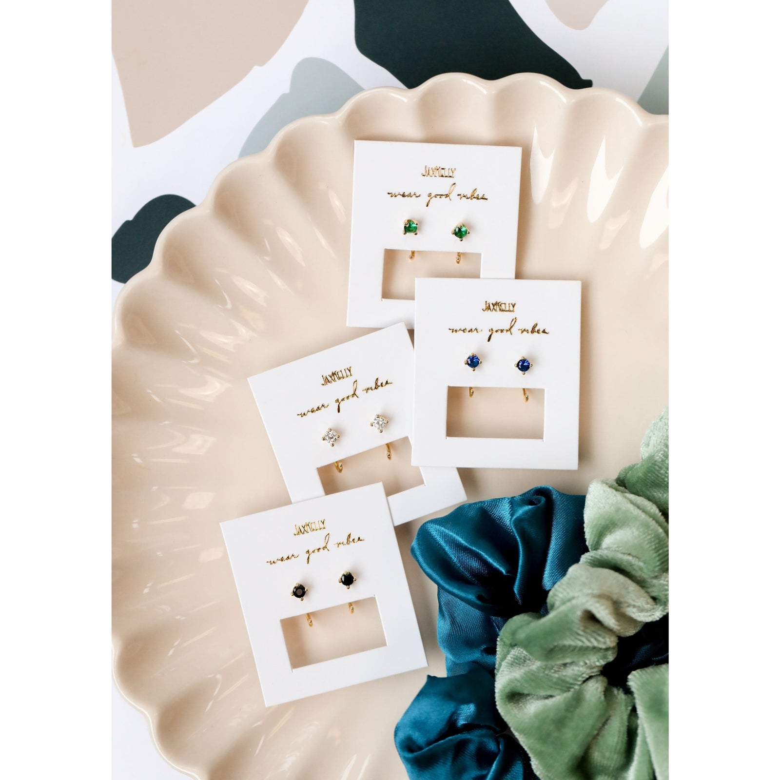 JaxKelly Earrings Emerald CZ Huggies